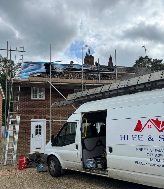 H Lee & Son Roofing Services van on site during a roofing job