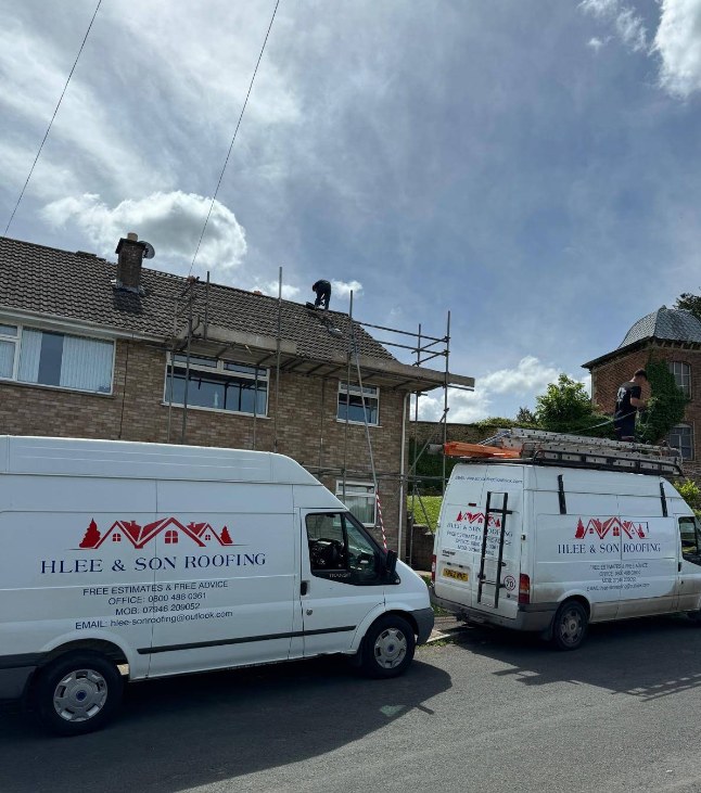 H Lee & Son Roofing Services van parked on a residential street in Berkshire